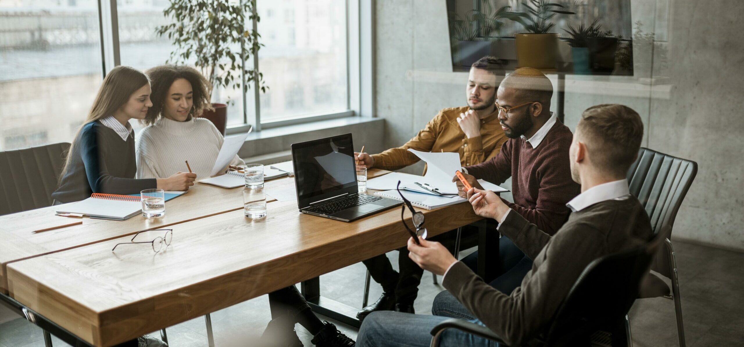 front-view-people-having-meeting-office